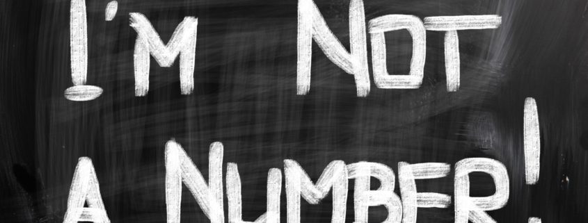 'I'm not a number' written on a blackboar