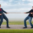 Workplace persona and at home persona playing tug of war
