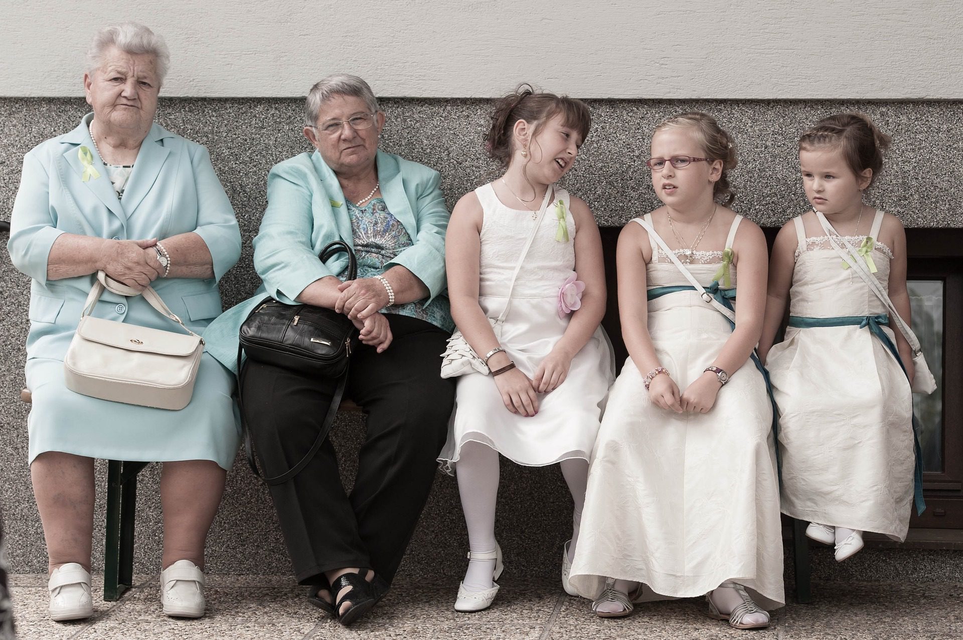 Generations of women in a family sitting next to each other