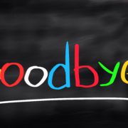 Goodbye written on a chalkboard with different colored letters